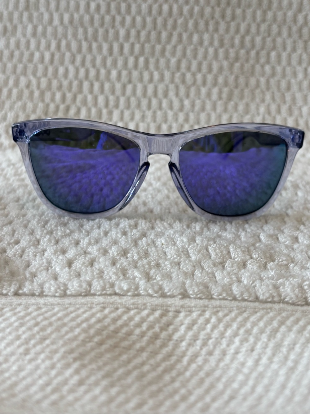 Oakley Clear Frame Sunglasses with Blue Mirror Lenses